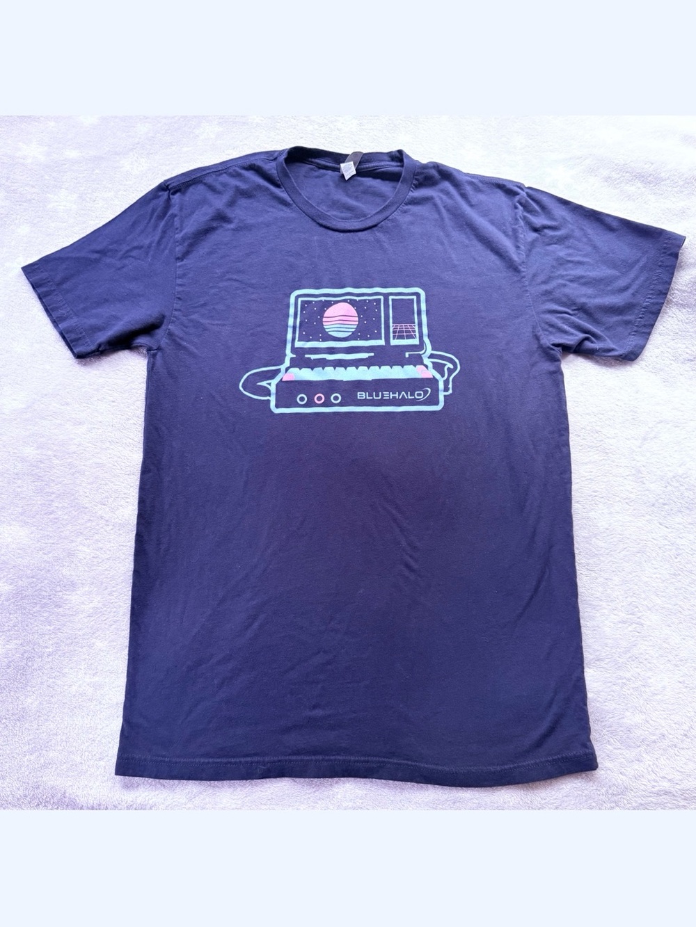 Navy tee with retro graphic from Next Level Apparel